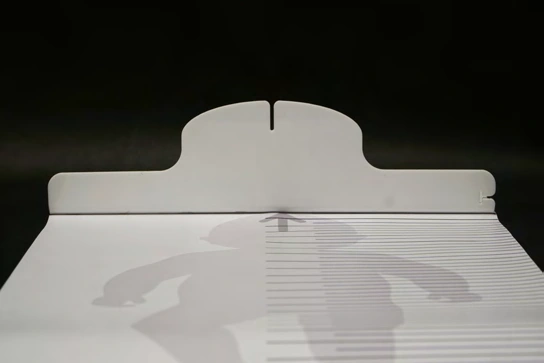 Front view of the headrest and alignment surface on the infant measuring mat.