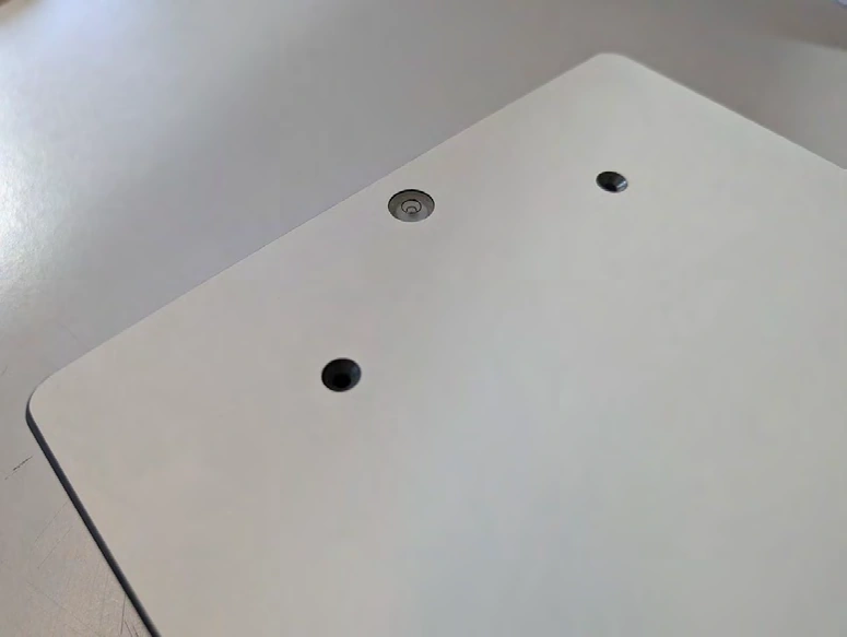 Scale underside showing wire grooves and an O-ring-sealed electronics cavity.